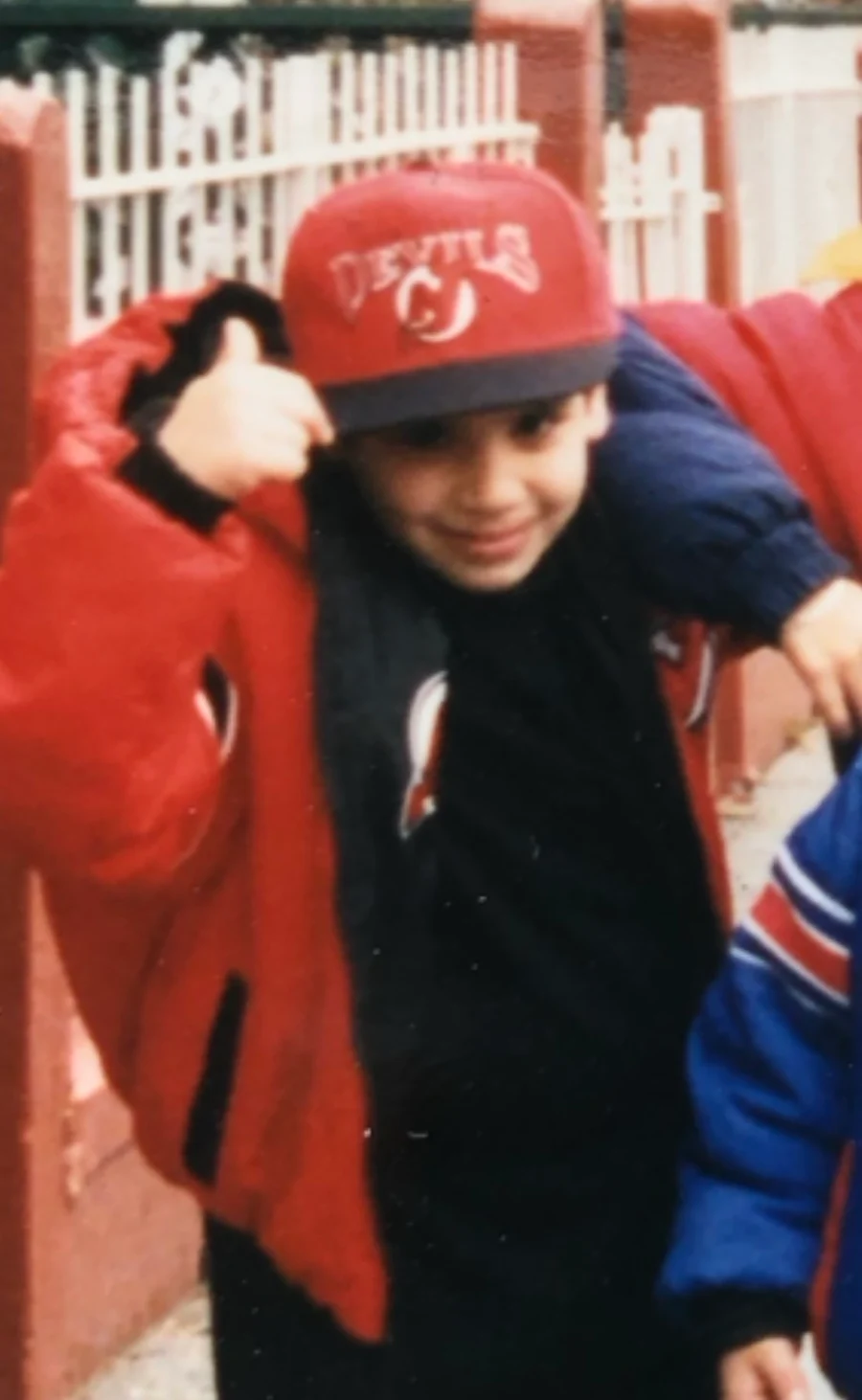 Jordan Perez as a child wearing a Devils cap